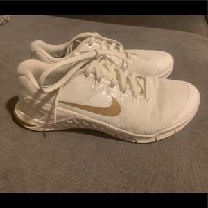 Nike 7.5 womans Metcons gold